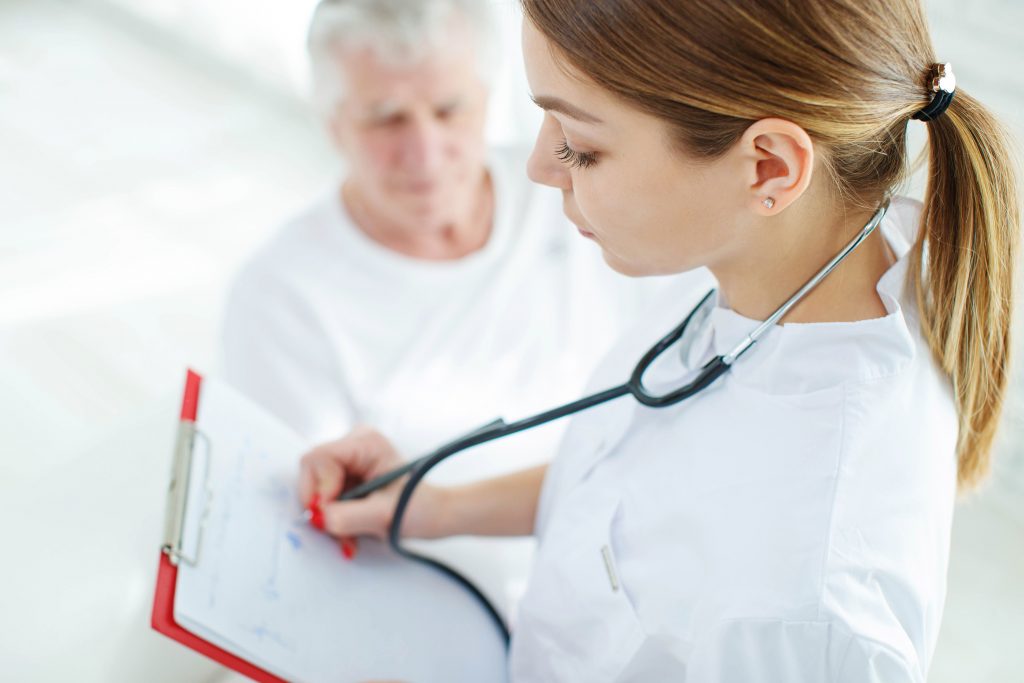 Female Nurse with Patient