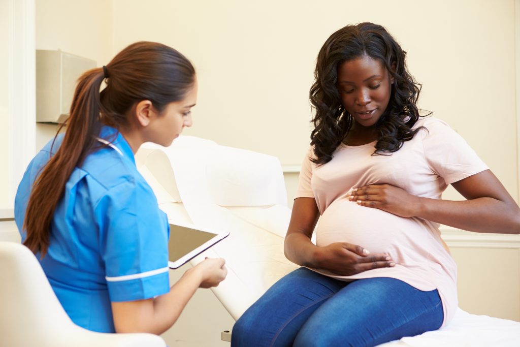 nurse and pregnant patient